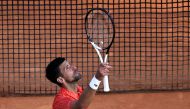 Serbian Novak Djokovic celebrates after winning his Monte-Carlo ATP Masters Series tournament round of 64 tennis match against Ivan Gakhov in Monaco on April 11, 2023. (Photo by Valery Hache / AFP)