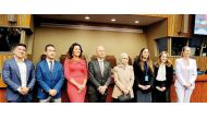 Permanent Representative of the State of Qatar to the UN H E Sheikha Alya Ahmed bin Saif Al Thani  (fourth right) with other officials during the celebration.