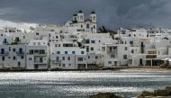 A photo shows buildings in the village of Naoussa, in Greece's popular travel island of Paros, on April 6, 2023. Photo by Louisa GOULIAMAKI / AFP