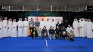 QOC Secretary-General Jassim bin Rashid Al Buenain poses for a group photo with officials and participants.