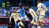 Napoli's Nigerian forward Victor Osimhen (C) controls the ball during the Italian Serie A football match between Napoli and Hellas Verona at the Maradona stadium in Naples, on April 15, 2023. (Photo by Andreas SOLARO / AFP)
