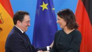 German Foreign Minister Annalena Baerbock and Spanish Foreign Minister Jose Manuel Albares Bueno shake hands after a joint press conference on April 21, 2023 at the Foreign Ministry in Berlin. (Photo by Odd Andersen / AFP)