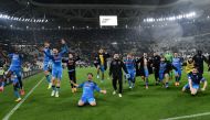 Napoli's players celebrate after winning in the Italian Serie A football match between Juventus and Napoli on April 23, 2023 at the Juventus stadium in Turin. Photo by Isabella BONOTTO / AFP