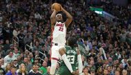Jimmy Butler #22 of the Miami Heat shoots over Wesley Matthews #23 of the Milwaukee Bucks during the second half of Game 5 of the Eastern Conference First Round Playoffs at Fiserv Forum on April 26, 2023 in Milwaukee, Wisconsin.  Stacy Revere/Getty Images/AFP