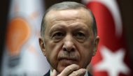 Turkish President and leader of the Justice and Development Party (AK Party), Recep Tayyip Erdogan delivers a speech during his party's group meeting at the Turkish Grand National Assembly in Ankara, on March 29, 2023. (Photo by Adem Altan / AFP)