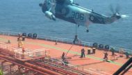 This grab taken from a video released by Iran's Army office on April 28, 2023, shows Iranian naval soldiers boarding the Advantage Sweet oil tanker off the coast of Oman. (Photo by Iranian Army office / AFP)