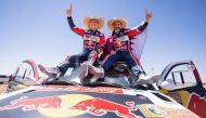 Qatari driver Nasser Al Attiyah celebrates with his French co-driver Mathieu Baumel celebrate after winning the Sonora Rally.