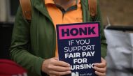 Members of the Royal College of Nursing (RCN) union man a picket line outside Great Ormond Street Hospital for Children in London on May 1, 2023. (Photo by Daniel LEAL / AFP)