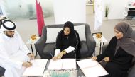 Run S Korshel, Charge d’affaire of the Somali Embassy in Qatar, Mohammed Massani, Chairman of KON Groups, and Hissa Suwaidi, Chairperson of KON Groups, signing the agreement.