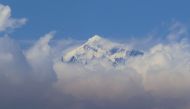 In this file photo taken on March 7, 2023, an aerial picture taken midair from an helicopter shows the summit of Mount Everest, the highest mountain in the world at 8,848 metres, in Nepal's Himalayas range. Photo by Sebastien BERGER / AFP