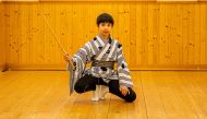 This picture taken on April 5, 2023 shows 10-year-old French-Japanese kabuki actor Maholo Terajima in a rehearsal room at the Kabuki-za theatre in Tokyo. (Photo by Philip Fong / AFP)