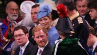 Britain's Prince Harry, Duke of Sussex talks to Britain's Princess Anne, Princess Royal at Westminster Abbey in central London on May 6, 2023. (Photo by Richard Pohle / Pool / AFP)