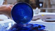 A photograph shows smashed Lapis Lazuli blue pigment at the Rijksmuseum's drawing school in Amsterdam on April 6, 2023 (Photo by John Thys / AFP)
