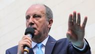 File photo: Chairman and founder of the Turkish centre-left party Memleket (Homeland Party) Muharrem Ince gestures as he delivers a speech on stage during a political rally to launch this new party Memleket, in front of the party headquarters, in Ankara, on May 18, 2021. (Photo by Adem Altan / AFP)