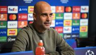 Manchester City's Spanish manager Pep Guardiola attends a press conference at Manchester City training ground in Manchester, north-west England on May 16, 2023, on the eve of their UEFA Champions League semi-final second leg football match against Real Madrid. (Photo by Oli SCARFF / AFP)