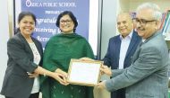 Birla Public School officials receiving QNSA Accreditation certificate.