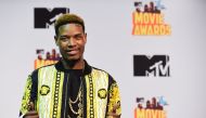US rapper Fetty Wap poses in the press room during the 2015 MTV Movie Awards in Los Angeles, California, on April 12, 2015. (Photo by Frederic J. BROWN / AFP)
