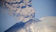 Ash and smoke billow from the Popocatepetl volcano as seen from the Santiago Xalitzintla community, state of Puebla, Mexico, on May 24, 2023. Photos by CLAUDIO CRUZ / AFP