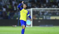 Nassr's Portuguese forward Cristiano Ronaldo gestures during the Saudi Pro League football match between Al-Nassr and Al-Ettifaq . (Photo by AFP)
