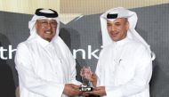 QIIB Head of Human Resources and Administrative Affairs, Ali Al Mesaifri receiving award from Qatar CSR National Program, CEO, Dr. Saif Ali Al Hajari at the Qatar CSR Summit.