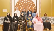 The First Lady of Zanzibar, H E Mariam Mwinyi, QBWA Vice Chairman, Aisha Al Fardan pose for a group photo with other officials during the meeting.