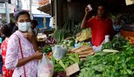 File Photo: A vendor sells vegetables to a customer amid the rampant food inflation, amid Sri Lanka's economic crisis, in Colombo, Sri Lanka, July 29 , 2022. (REUTERS/Kim Kyung-Hoon)