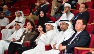 Minister of Municipality H E Dr. Abdullah bin Abdulaziz bin Turki Al Subaie (third right); QU President Dr. Hassan bin Rashid Al Derham (second right); and others during the session. 
