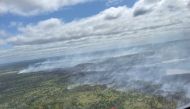 In this May 29, 2023, aerial image courtesy of the Nova Scotia Government in Canada, smoke rises from the Tantallon wildfire, west of Halifax. Photos by Handout / Nova Scotia Government / AFP