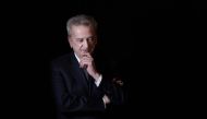 A file photo taken on December 20, 2021 shows Lebanon's Central Bank governor Riad Salameh posing during a studio photo session in Beirut. (Photo by Joseph Eid / AFP)
