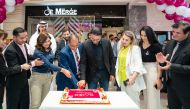 Daiso Japan officials cutting a cake at the opening of new branch in Ezdan Mall.
