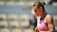 Belarus' Aryna Sabalenka reacts after a point to Russia's Kamilla Rakhimova during their women's singles match on day six of the Roland-Garros Open tennis tournament at the Court Philippe-Chatrier in Paris on June 2, 2023. Photo by JULIEN DE ROSA / AFP