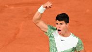 Spain's Carlos Alcaraz Garcia celebrates a point against Greece's Stefanos Tsitsipas during their men's singles quarter final match on day ten of the Roland-Garros Open tennis tournament at the Court Philippe-Chatrier in Paris on June 6, 2023. Photo by Emmanuel DUNAND / AFP