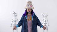 Murakami poses during a photo session at the Gagosian Gallery in Le Bourget, outside Paris, on June 8, 2023. (Photo by JOEL SAGET / AFP)