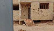 This picture shows a damaged house that was hit by an artillery shell in southern khartoum on June 11, 2023.  (Photo by AFP)