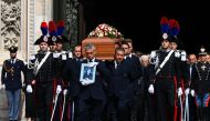 Pallbearers carry the coffin of Italy's former prime minister and media mogul Silvio Berlusconi outside the Duomo cathedral in Milan on June 14, 2023 at the end of the state funeral of Berlusconi. (Photo by Piero CRUCIATTI / AFP)