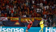 Spain's forward Joselu celebrates scoring his team's second goal during the UEFA Nations League semi final football match between Spain and Italy at the De Grolsch Veste Stadium in Enschede on June 15, 2023. (Photo by KENZO TRIBOUILLARD / AFP)