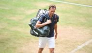Russia's Daniil Medvedev leaves the centre court after loosing his match against Spain's Roberto Bautista Agut at the end of the men's singles quarter-final of the ATP 500 Halle Open tennis tournament in Halle, western Germany, on June 23, 2023. (Photo by Carmen Jaspersen / AFP)