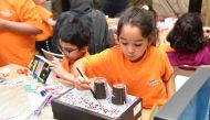 Children engage in an activity at the Summer Camp.