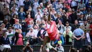 US player Venus Williams waves to the audience as she leaves the court following her defeat against Ukraine's Elina Svitolina at the end of their women's singles tennis match on the first day of the 2023 Wimbledon Championships at The All England Tennis Club in Wimbledon, southwest London, on July 3, 2023. (Photo by Daniel Leal / AFP)