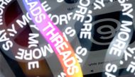 This photo illustration created in Washington, DC, on July 6, 2023, shows the logo for Threads, an Instagram app, reflected in its opening page. (Photo by Stefani Reynolds / AFP)