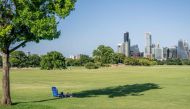 A person rests in the shade at Zilker Metropolitan Park on July 10, 2023 in Austin, Texas. (Photo by Brandon Bell/Getty Images/AFP)

