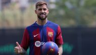 FC Barcelona's newly signed Spanish defender Inigo Martinez poses for pictures during his official presentation at the Joan Gamper training ground in Sant Joan Despi on July 13, 2023. Photo by LLUIS GENE / AFP
