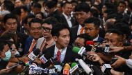 Move Forward Party Leader and prime ministerial candidate Pita Limjaroenrat speaks to the media in Thai Parliament after the parliamentary vote for the premiership in Bangkok on July 13, 2023. (Photo by Lillian SUWANRUMPHA / AFP)
