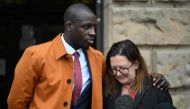 French footballer Benjamin Mendy stands with his solicitor outside Chester Crown Court in Chester, north-west England, on July 14, 2023, having been cleared of one count of rape and another of attempted rape. (Photo by Oli SCARFF / AFP)
