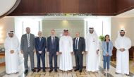 Francois Good, Senior Vice President, TotalEnergies Refining & Petrochemicals Orient & Growth; Ghazi Shahin, Managing Director TotalEnergies Refining & Petrochemicals – Qatar; Khalid bin Khalifa Al Thani, CEO of Qatargas Operating Co. Ltd; and Fahad Mohammed Al Khater, Chief Offshore, Terminals and Refining Officer with other officials pose for a group photo during the event.