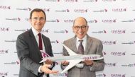 Qatar Airways Group Chief Executive, H E Akbar Al Baker (right), and Chairman of the Board of Toulouse-Blagnac Airport, Philippe Crébassa marking the arrival of Qatar Airways' inaugural flight.