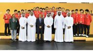 QTTA President Khalil Al Mohannadi along with other officials poses for a group photo with the winners on third day of the championships.