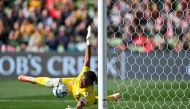  Nigeria's goalkeeper #16 Chiamaka Nnadozie saves a penalty kick by Canada's forward #12 Christine Sinclair during the Australia and New Zealand 2023 Women's World Cup Group B football match between Nigeria and Canada at Melbourne Rectangular Stadium, also known as AAMI Park, in Melbourne on July 21, 2023. (Photo by Izhar KHAN / AFP)