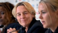 Germany's coach Martina Voss-Tecklenburg (L) listens to player Merle Frohms (R) speak during a press conference in Melbourne on July 23, 2023, on the eve of the Women's World Cup football match between Germany and Morocco. Photo by William WEST / AFP