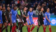 France and Jamaica players walk off the pitch after the final whistle of the Australia and New Zealand 2023 Women's World Cup Group F football match between France and Jamaica at Sydney Football Stadium in Sydney on July 23, 2023. (Photo by FRANCK FIFE / AFP)
